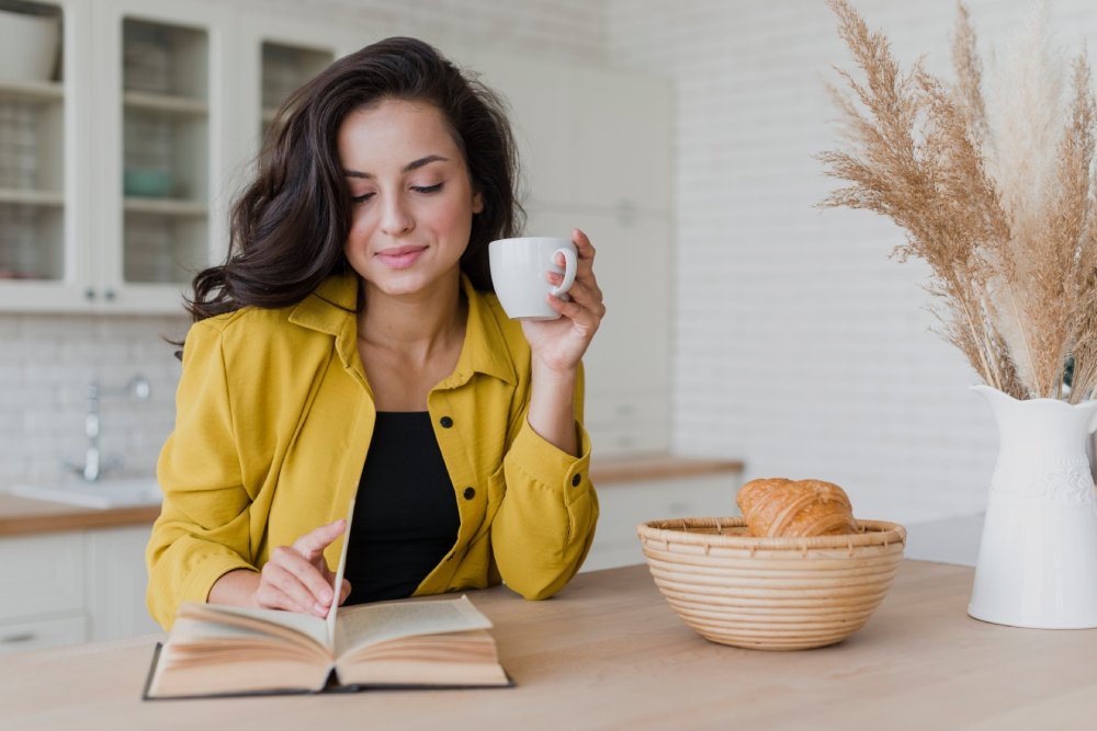 A Person Reading In The Morning, Gaining Inspiration To Start The Day Right